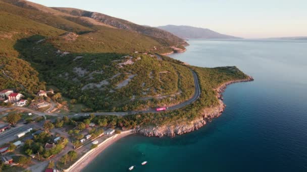 Aerial View Landscape Rocky Coast of Croatia with Curvy Mountain Road at Sunset — ストック動画