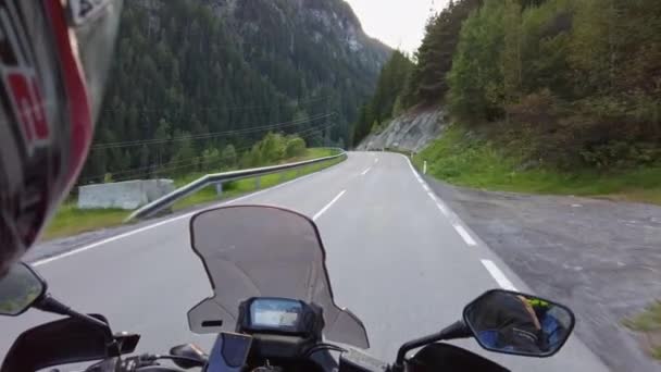 POV of Biker Rides a Motorcycle on a Scenic Mountain Road in Austria — Stock video