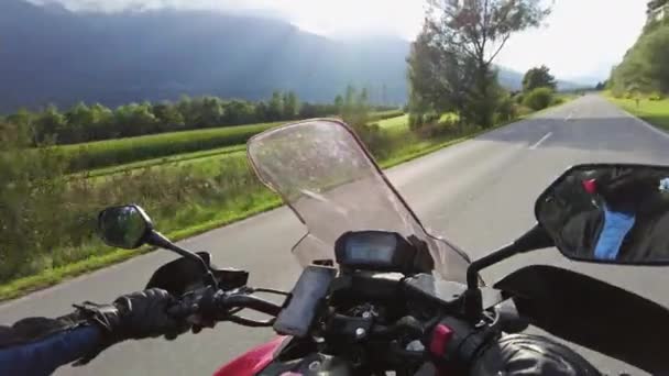POV Biker Rides a Motorcycle on a Scenic Sunny Mountain Road, Austria — Wideo stockowe