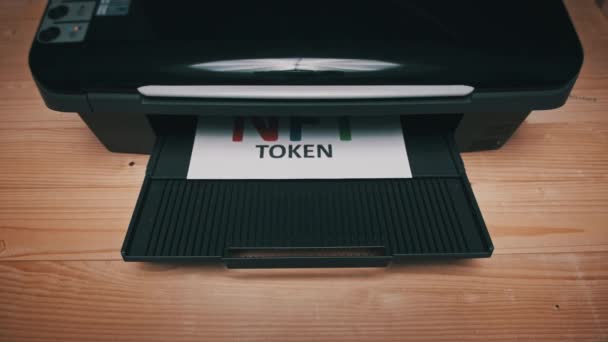 NFT Token Printing, Inscription on White Sheet of Paper Printed by a Jet Printer — Stock video
