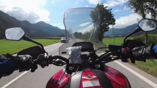 POV of Biker Rides a Motorcycle on a Scenic Mountain Road in Austria — Stock video