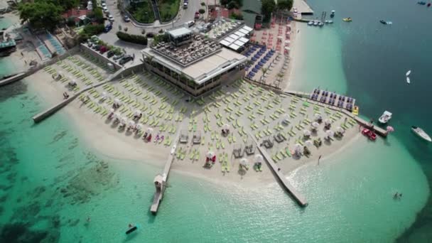 Aerial View Azure Beach with Empty Sun Loungers, Balkan Coast Ionian Sea Albania — Αρχείο Βίντεο