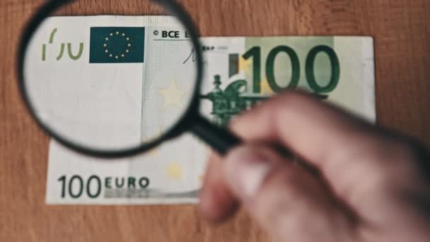 100 Euro Under Magnifying Glass — Stock Video