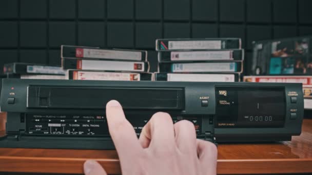 Insert VHS Cassette into VCR and Push Play Button — стокове відео