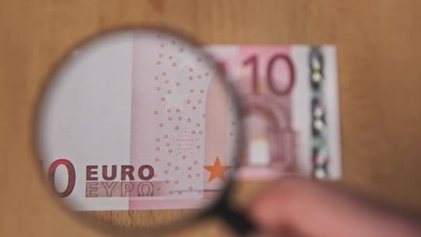 10 euros bajo lupa — Vídeo de stock