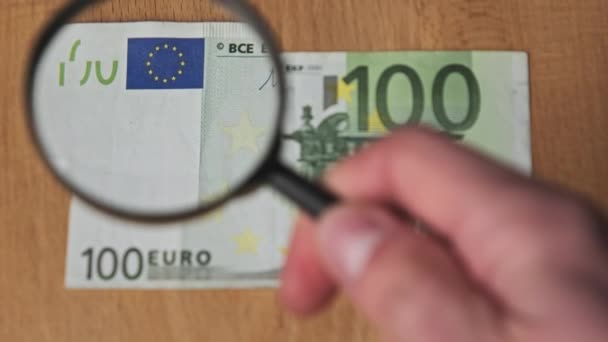 100 Euro Under Magnifying Glass — Stock Video