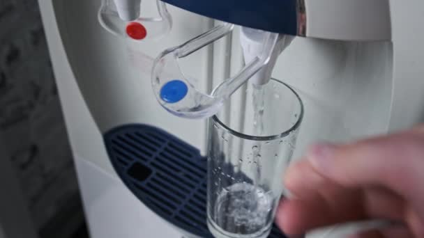 Clear Water is Pouring into Glass From the Water Cooler — Stock Video
