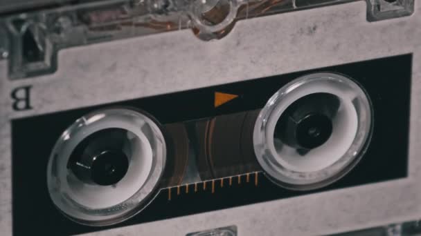 Audio Cassette in the Tape Recorder Playing and Rotates — Stock Video