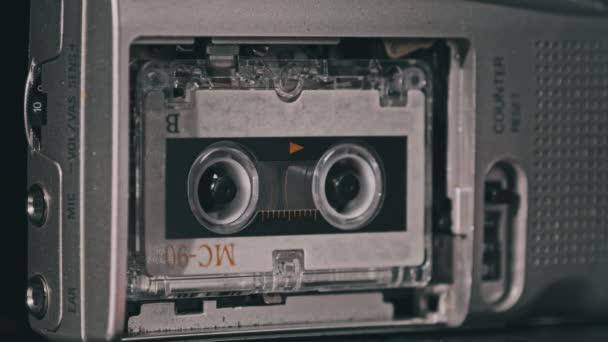 Audio Cassette in the Tape Recorder Playing and Rotates — Stock Video