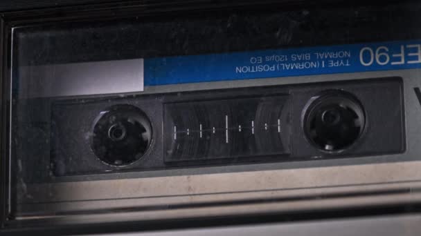 Audio Cassette Tape Rotates in Deck of an Old Tape Recorder — Stock Video