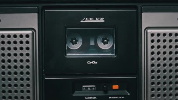 Vintage Transparent Audio Cassette Playing in Deck of an Old Tape Recorder — Stock Video