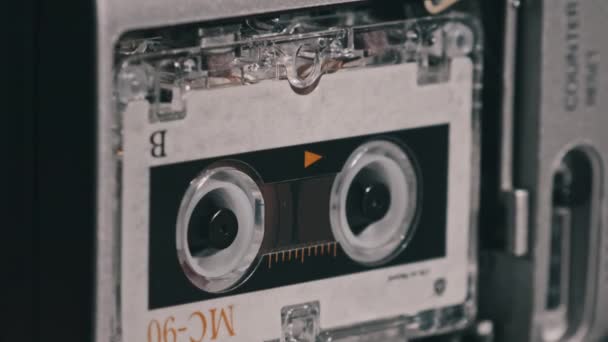 Audio Cassette in the Tape Recorder Playing and Rotates — Stock Video