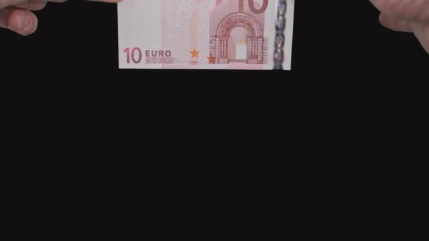 Male Hands Show a Banknote of 10 Euros From Top to Bottom with Alpha Channel — Vídeo de stock