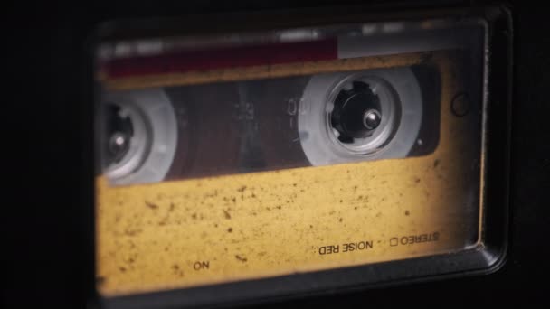 Vintage Yellow Audio Cassette Playing in Deck of an Old Tape Recorder — ストック動画