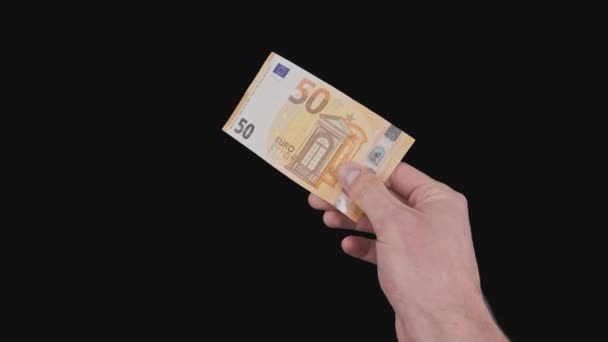 Male Hand Shows a Banknote of 50 Euros with Alpha Channel — Stock Video