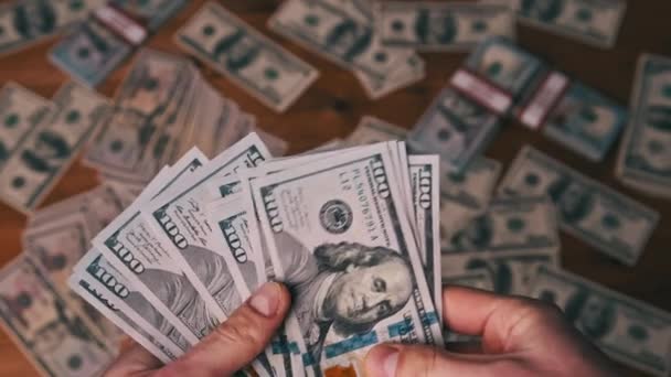 Dollars in Male Hands on Background of Table with Money, Counting Banknotes — 비디오