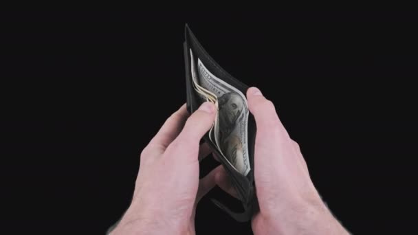 Mãos masculinas mostram uma carteira preta com algumas contas de dólar no canal Alpha — Vídeo de Stock