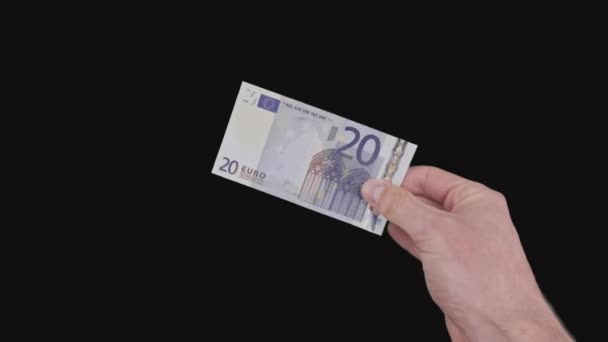 Mão masculina mostra uma nota de 20 euros com canal Alpha — Vídeo de Stock