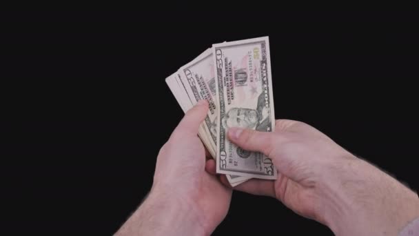 Male Hands Holding a Fan of a Lot of 50 Dollar Bills with Alpha Channel — Vídeos de Stock