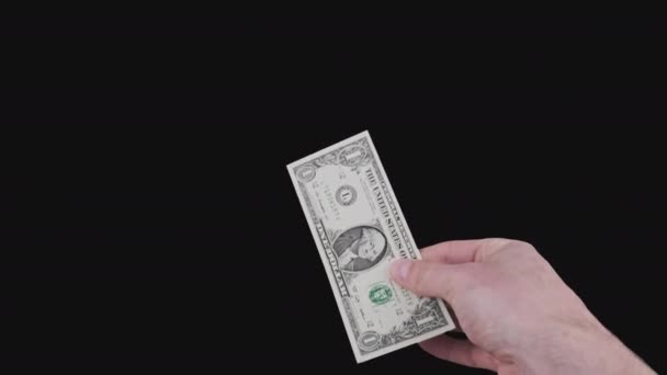 Männliche Hand zeigt Ein-Dollar-Schein mit Alpha-Kanal — Stockvideo