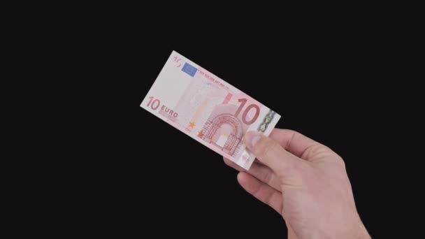 Mannelijke Hand toont een bankbiljet van 10 Euro met Alpha Channel — Stockvideo