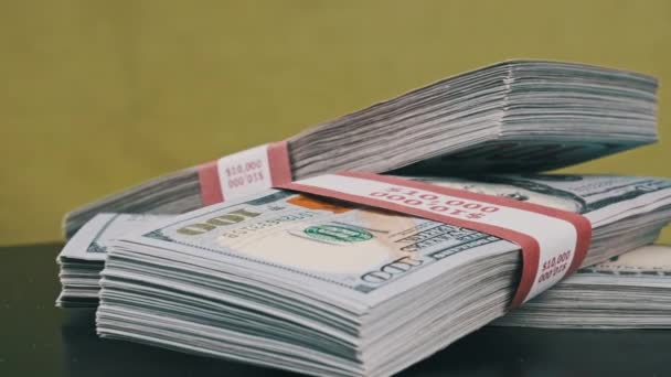 Dollars Bundles Rotate on Green Background, Heap of Money — стоковое видео