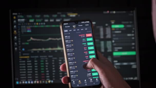Investor Checking Cryptocurrency Price on Smartphone Screen, Growth Crypto — Stock videók