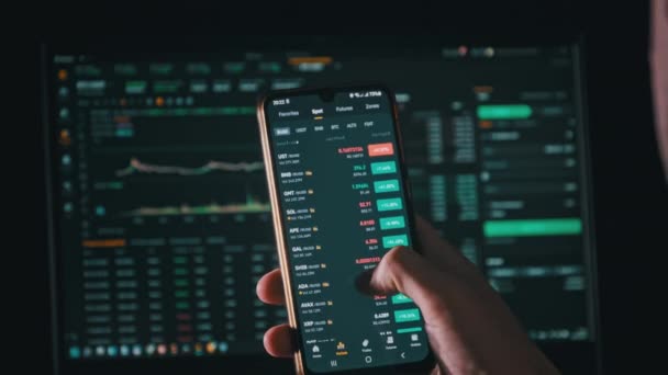 Investor Checking Cryptocurrency Price Smartphone Screen Many Crypto Assets Show — Vídeo de stock