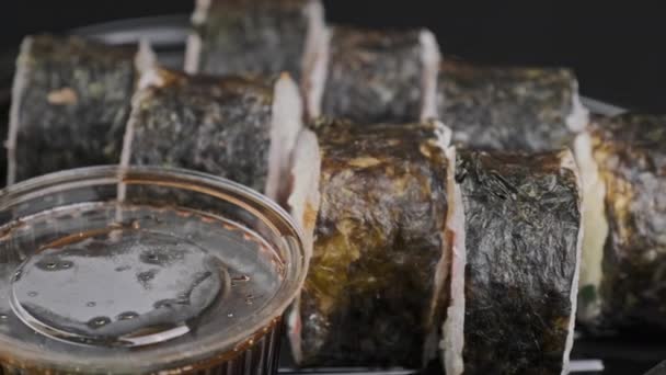 Japanese Sushi Rolls Plastic Box Rotating Close Takeaway Fresh Sushi — Stock videók