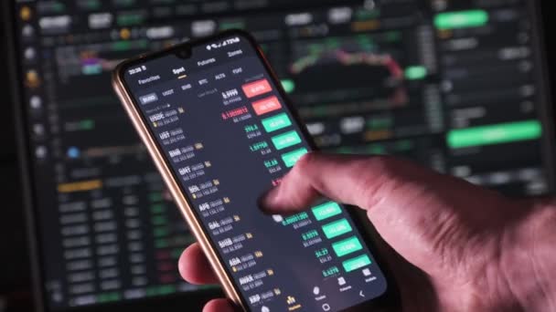 Investor Checking Cryptocurrency Price Smartphone Screen Many Crypto Assets Show — Stock Video