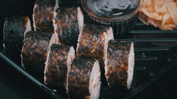 Japanese Sushi Rolls Plastic Box Rotating Close Takeaway Fresh Sushi — Video Stock