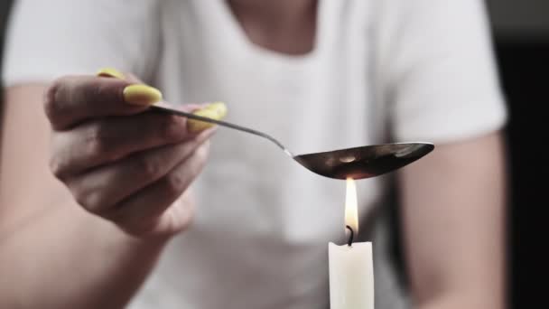 Woman Drug Addict Cooking Drugs Spoon Candle Flame Warming Narcotic — Video