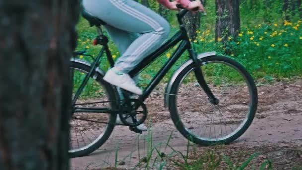 Young Woman Bicycle Rides Forest Path Summer Day Slow Motion — Stok video