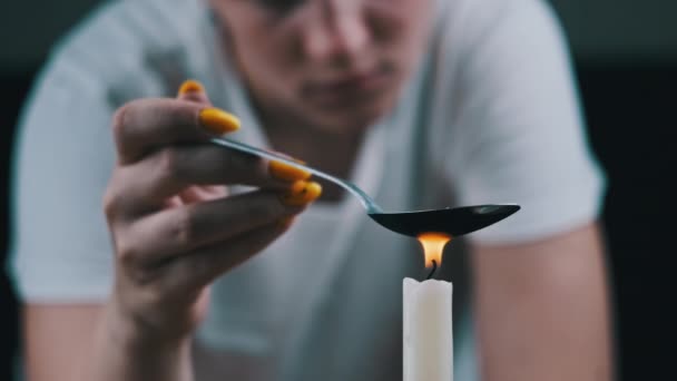 Woman Drug Addict Cooking Drugs Spoon Candle Flame Warming Narcotic — Stockvideo