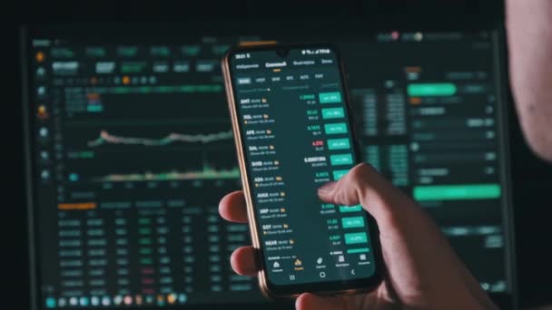 Investor Checking Cryptocurrency Price Smartphone Screen Many Crypto Assets Show — Vídeo de stock