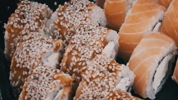 Sushi Rolls Rotating Close Fresh Japanese Sushi Philadelphia Cheese Nori — Vídeos de Stock