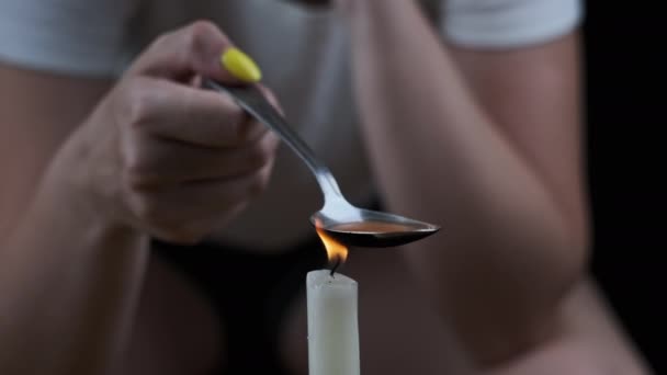 Woman Drug Addict Cooking Drugs Spoon Candle Flame Warming Narcotic — Stockvideo