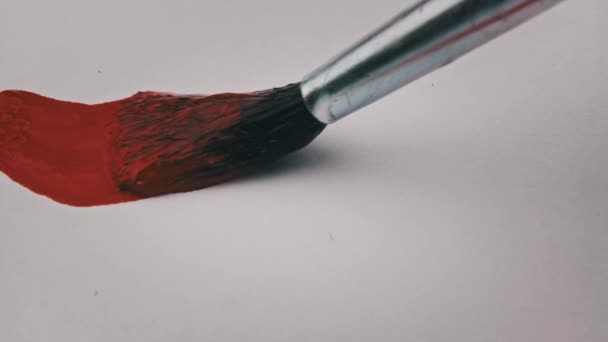 Brush Red Paint Draws Line White Paper Super Macro Drawing — Stockvideo