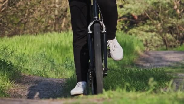 Young Woman Bicycle Rides Green Forest Path Sunny Summer Day — Video Stock