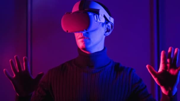 Young Man Helmet Interacts Virtual Reality Using His Hands Male — Video