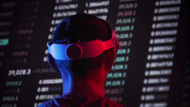 Trader Virtual Reality Helmet Looks Cryptocurrency Charts Young Man Analyzes — Vídeos de Stock