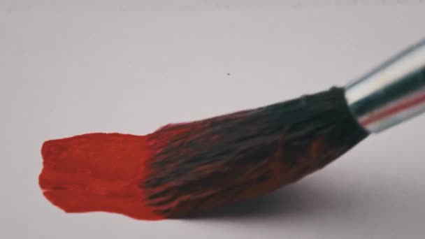 Brush Red Paint Draws Line White Paper Super Macro Drawing — Vídeo de stock