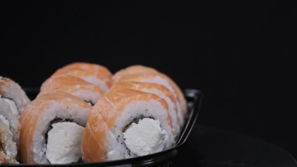 Sushi Rolls Plastic Box Rotating Close Takeaway Fresh Japanese Sushi — Video