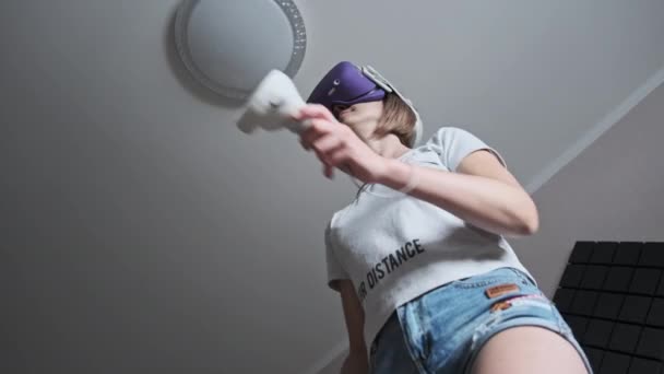 Young Woman Virtual Reality Headset Plays Game Home Emotional Female — Wideo stockowe