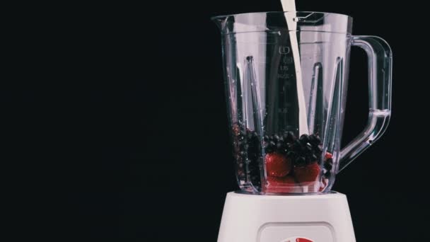 Pouring Milk Blender Fruit Making Healthy Fresh Juice Black Background — Stockvideo