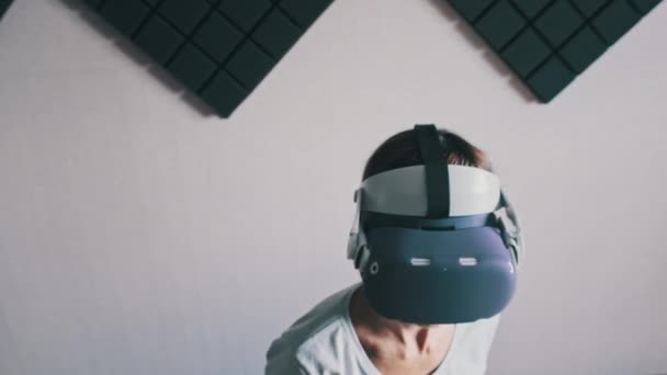 Young Woman Helmet Plays Game Home Emotional Female Using Virtual — Wideo stockowe