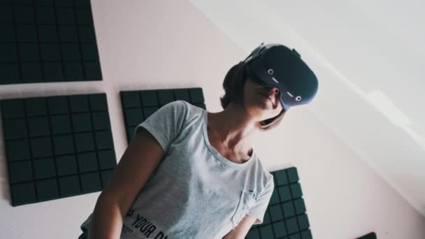 Young Woman Virtual Reality Headset Plays Game Home Emotional Female — Stock Video