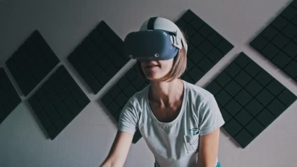 Young Woman Virtual Reality Headset Plays Game Home Emotional Female — Stock Video