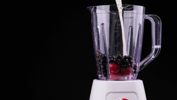 Pouring Milk Blender Fruit Making Healthy Fresh Juice Black Background — Vídeo de Stock