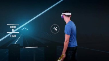 Person in virtual reality headset plays an action VR game in augmented reality. Simulation gaming process in a helmet. Mixed Reality. Virtual reality goggles on a gamer with artificial light swords